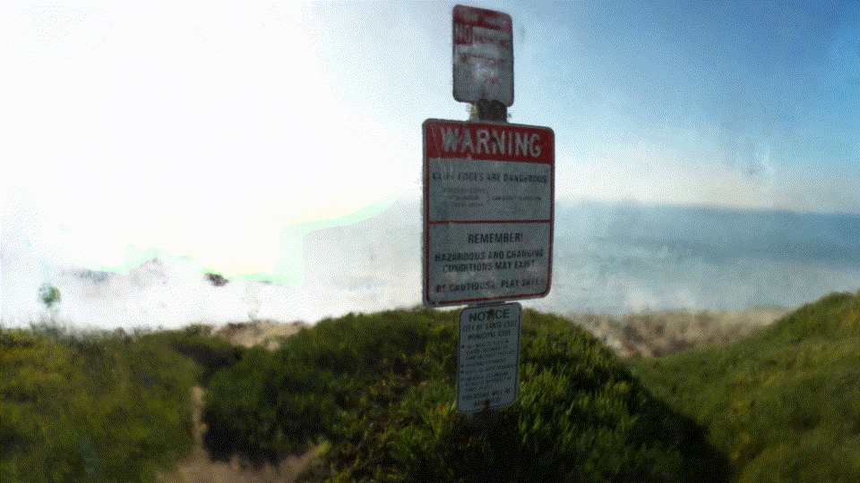 animation of a signpost by the ocean rendered from the NeRF