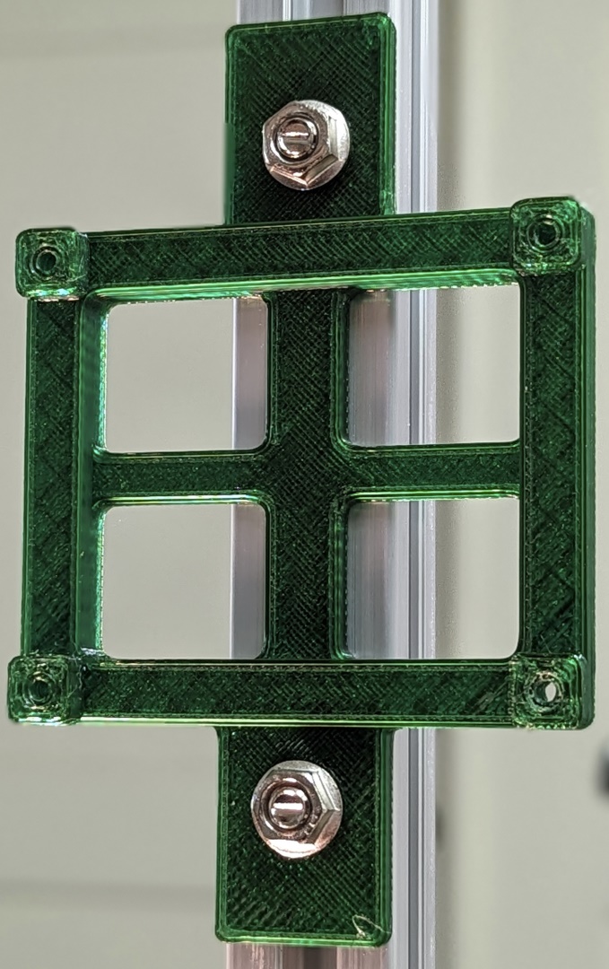 Plastic bracket attached to 2020 t-slot